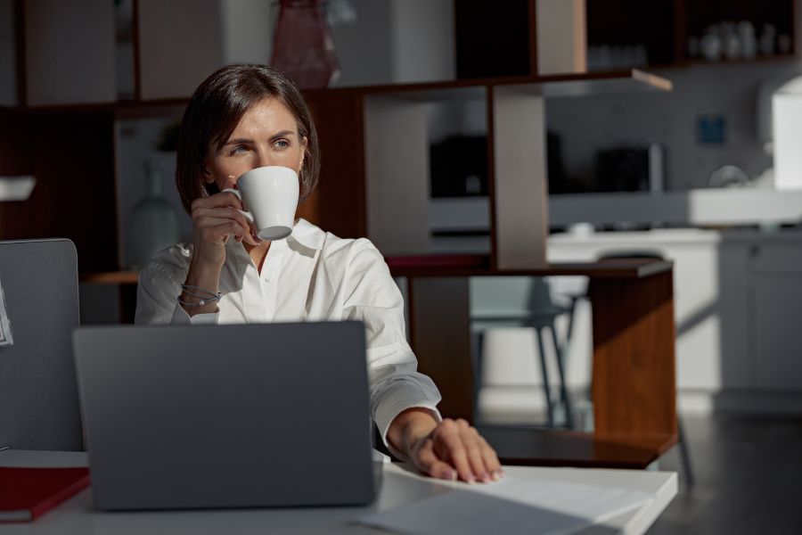 Businesswoman working at the office using laptop